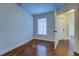 Empty bedroom featuring a window and neutral paint; ready for your personal touches at 45 Kinloch Ct, Covington, GA 30014