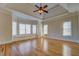 Spacious bedroom with hardwood floors, bay window and tray ceiling design at 45 Kinloch Ct, Covington, GA 30014