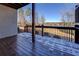 View from wooden deck overlooking a lake at 45 Kinloch Ct, Covington, GA 30014
