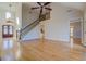 Open floor plan with hardwood floors, staircase, and view to the entry at 45 Kinloch Ct, Covington, GA 30014
