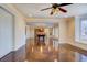 Large, open living room boasts lustrous floors and an adjoining billiards room at 45 Kinloch Ct, Covington, GA 30014