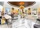 Tropical-themed dining room with chandelier at 1114 Ivey Chase Pl, Dacula, GA 30019