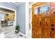 Entryway with wood door and marble floors at 1114 Ivey Chase Pl, Dacula, GA 30019