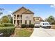 Two-story house with stone accents and a covered porch at 1114 Ivey Chase Pl, Dacula, GA 30019