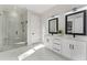 Elegant bathroom with double vanity, large shower, and modern fixtures at 1682 Union Grove Church Rd, Auburn, GA 30011