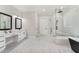 Luxurious bathroom with marble flooring and a large walk-in shower at 1682 Union Grove Church Rd, Auburn, GA 30011