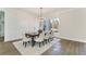 Elegant dining room features a statement wall and hardwood floors at 1682 Union Grove Church Rd, Auburn, GA 30011