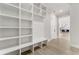 Functional hallway with built-in shelving and bench seating at 1682 Union Grove Church Rd, Auburn, GA 30011