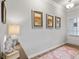 Bright foyer with hardwood floors and a view into the living room at 20 Jacobs Farm Ln # 10, Lawrenceville, GA 30043