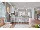 Kitchen island with seating for three and modern pendant lighting at 20 Jacobs Farm Ln # 10, Lawrenceville, GA 30045