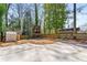 Large backyard with a playhouse, slide, picnic tables, and a shed, perfect for outdoor fun at 2715 Memorial Se Dr, Atlanta, GA 30317