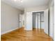 Bedroom with hardwood floors and view of closet at 2715 Memorial Se Dr, Atlanta, GA 30317