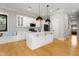 Kitchen featuring white cabinets, stainless steel appliances, and a large island at 2715 Memorial Se Dr, Atlanta, GA 30317