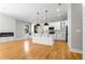 Bright living room and kitchen with a fireplace and stainless steel appliances at 2715 Memorial Se Dr, Atlanta, GA 30317