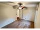 Cozy bedroom with neutral carpet, ceiling fan and two closets at 780 Navajo Trl, Covington, GA 30016