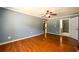 Bedroom with hardwood floors and access to bathroom at 780 Navajo Trl, Covington, GA 30016