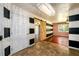 Bright dining area with hardwood floors and a view into the living room at 780 Navajo Trl, Covington, GA 30016