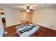 Bright living room with hardwood floors and barn door at 780 Navajo Trl, Covington, GA 30016