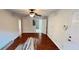 Living room with hardwood floors and view to the bathroom at 780 Navajo Trl, Covington, GA 30016