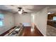 Living room with hardwood floors, view of kitchen at 780 Navajo Trl, Covington, GA 30016