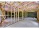 Unfinished basement with framed walls and pink insulation at 105 Eryn Ter, Covington, GA 30014