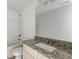 Bathroom with granite countertop and single sink vanity at 105 Eryn Ter, Covington, GA 30014