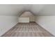 Bonus room with sloped ceilings and carpeted floor at 105 Eryn Ter, Covington, GA 30014