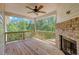 Covered deck with fireplace and wooded views at 105 Eryn Ter, Covington, GA 30014