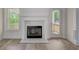 Modern fireplace with marble surround at 105 Eryn Ter, Covington, GA 30014