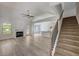Open living room with hardwood floors and fireplace at 105 Eryn Ter, Covington, GA 30014