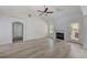 Spacious living room with hardwood floors and fireplace at 105 Eryn Ter, Covington, GA 30014