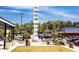 Community landmark in an outdoor setting surrounded by shops and green spaces at 1125 Blackshear Dr, Decatur, GA 30033