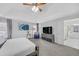 Large main bedroom with a tray ceiling and carpet flooring at 1125 Blackshear Dr, Decatur, GA 30033