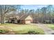 Brick ranch house with attached garage and large yard at 380 Stone Rd, Mcdonough, GA 30253