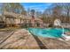 Inviting kidney-shaped pool with large backyard at 380 Stone Rd, Mcdonough, GA 30253