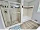 Bathroom with shower and tub, updated flooring at 4 Crestwood Rd, Cartersville, GA 30121