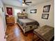 Cozy bedroom with hardwood floors and a bed at 4 Crestwood Rd, Cartersville, GA 30121