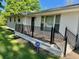 Inviting front porch with black metal railings and steps leading to the home's entrance at 4 Crestwood Rd, Cartersville, GA 30121