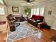 Living room with hardwood floors, featuring a comfortable seating area at 4 Crestwood Rd, Cartersville, GA 30121