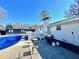 Spacious backyard with an in-ground pool, a deck with a grill, and a patio set for outdoor relaxation at 4 Crestwood Rd, Cartersville, GA 30121
