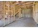 Unfinished basement with framed walls and exposed insulation at 215 Eryn Ter, Covington, GA 30014