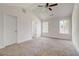 Bright bedroom featuring a ceiling fan and ample space at 215 Eryn Ter, Covington, GA 30014