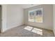 Bright bedroom with a large window and neutral carpet at 215 Eryn Ter, Covington, GA 30014