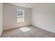 Bright bedroom with a window and carpet floor at 215 Eryn Ter, Covington, GA 30014
