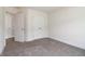 Spacious bedroom featuring plush carpeting and ample closet space at 215 Eryn Ter, Covington, GA 30014