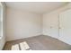 Charming bedroom with a large window and double closet at 215 Eryn Ter, Covington, GA 30014