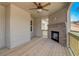 Spacious covered deck with fireplace and wooded views at 215 Eryn Ter, Covington, GA 30014