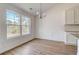 Spacious dining area with hardwood floors and large window at 215 Eryn Ter, Covington, GA 30014