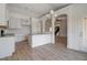 Open concept kitchen with island and views into living room at 215 Eryn Ter, Covington, GA 30014