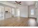 Spacious living room with hardwood floors, a fireplace, and an open floor plan at 215 Eryn Ter, Covington, GA 30014